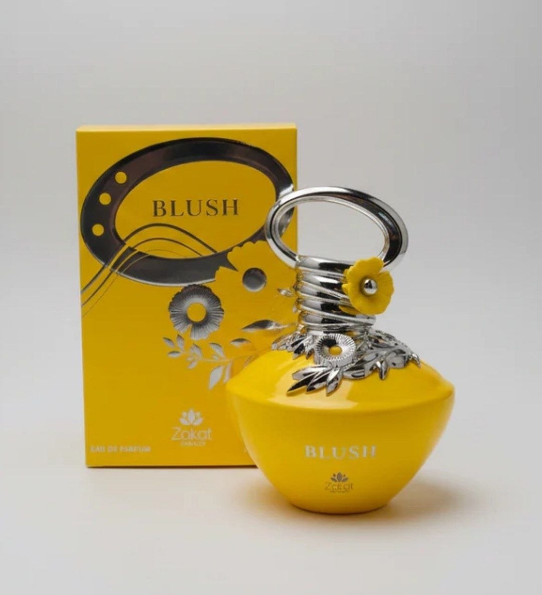 Blush by Zakat Parfums yellow bottle with silver floral details